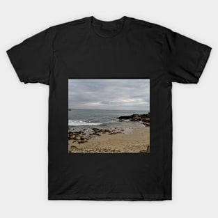 View from a sandy beach of a boat at sea T-Shirt